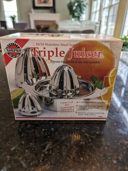 Photo of free Stainless steel triple juicer (Rockville MD 20850) #1