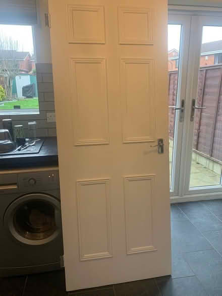 Photo of free 2 white interior doors with handles (Astley CV10) #2