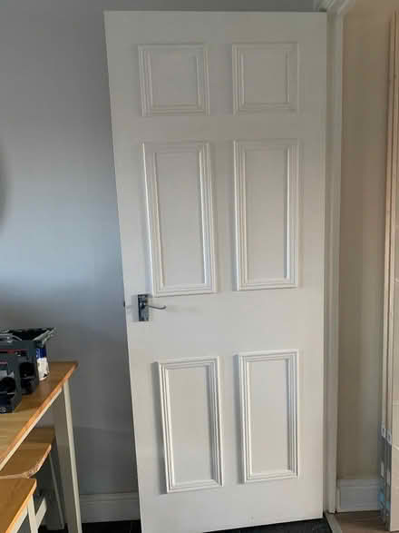 Photo of free 2 white interior doors with handles (Astley CV10) #1