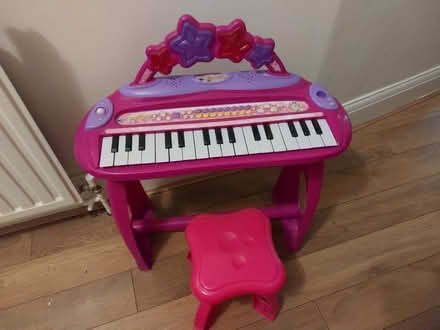 Photo of free Child's piano and stool (Gidea Park RM2) #1