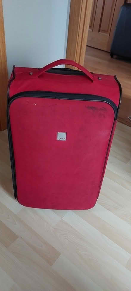 Photo of free Medium size suitcase (Passage West) #1