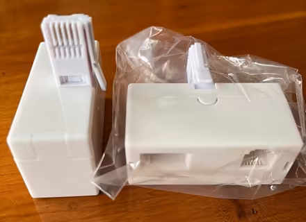 Photo of free Telephone adapters, RJ-11 cord (Barnes SW13) #1