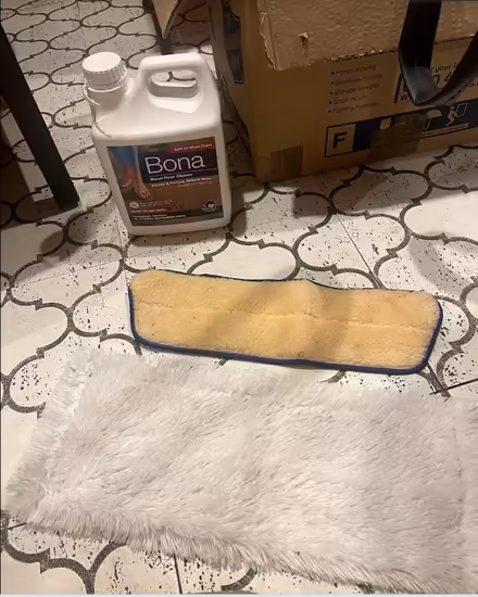 Photo of free Bona wood floor cleaning fluid and x2 mop heads (islington N1) #1