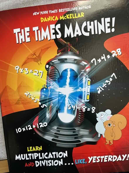 Photo of free "The Times Machine" math games book (Ball Square) #2
