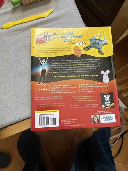 Photo of free "The Times Machine" math games book (Ball Square) #1