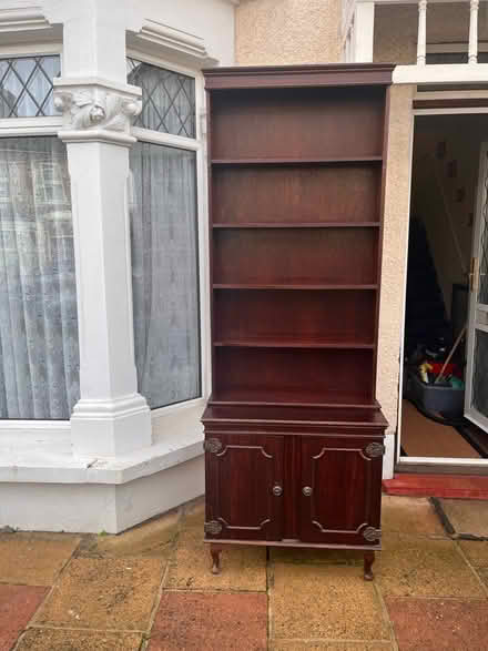 Photo of free Tall wood shelving cabinet (SE6) #1