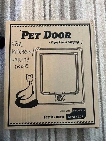 Photo of free White pet / cat flap (North Hinksey OX2) #1
