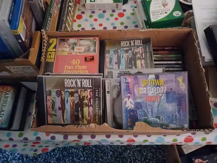 Photo of free hundreds of DVD's & some music CD's (Morley) #1