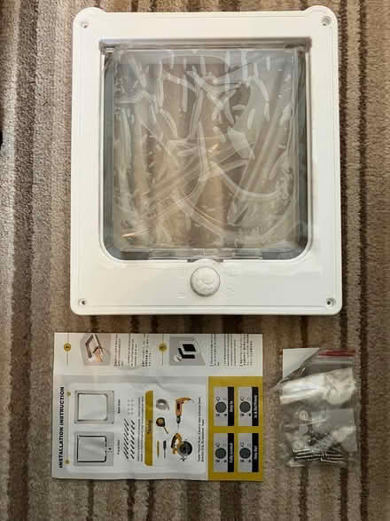 Photo of free White pet / cat flap (North Hinksey OX2) #2