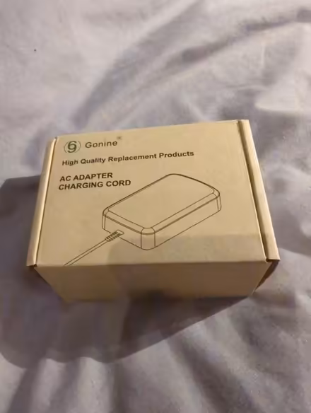 Photo of free AC adaptor charging cord (TF1) #1