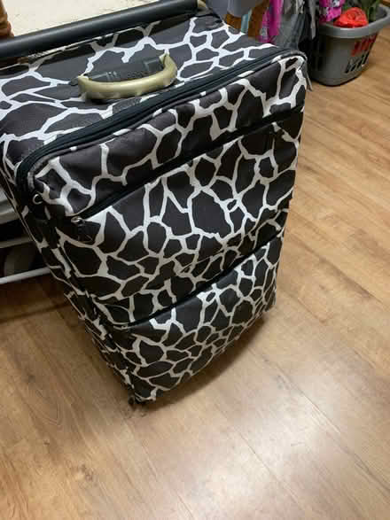 Photo of free Large suitcase (Guiseley) #1