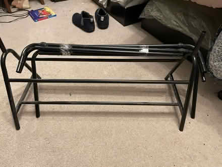 Photo of free Black metal rail with shoe rack (Wavertree Liverpool L15) #1