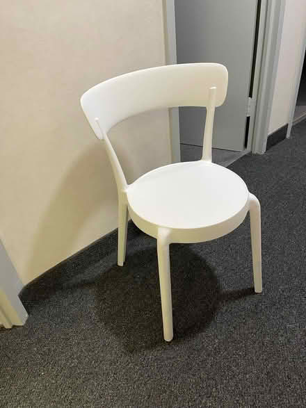 Photo of free Three white plastic chairs (Foggy Bottom) #1