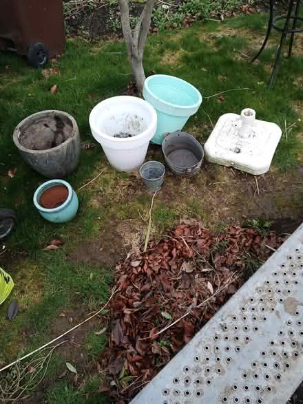 Photo of free Parasol base, flower pots (Swords) #1