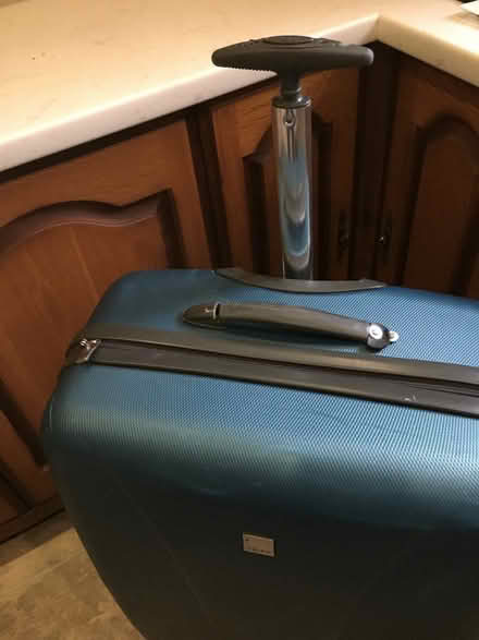 Photo of free Tripp large, hardbodied, teal 4 wheeled suitcase. (Uxbridge UB10) #2