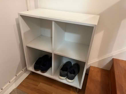 Photo of free 2x2 cube shelving unit white, feet (Duffel House, Vauxhall) #1