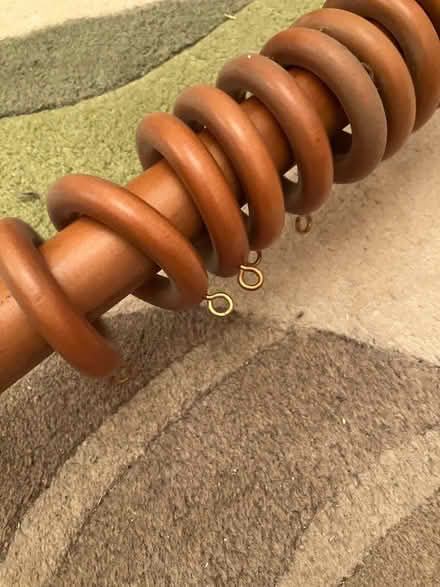 Photo of free Wooden curtain pole and rings 163cm (NN14) #1