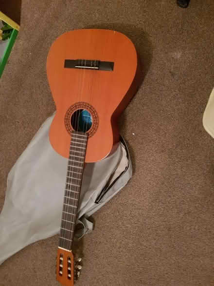 Photo of free Guitar with cover (OL12) #1
