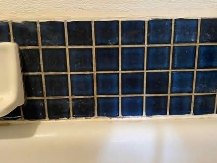 Photo of free 2” square dark blue tile (West side) #1