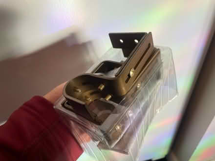 Photo of free Gold curtain rod brackets (Midtown) #2