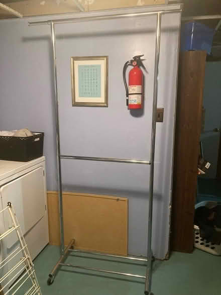Photo of free Rolling double hanging rack (White Oak) #1