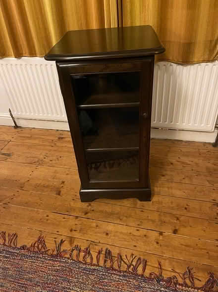 Photo of free Small Ercol glass fronted cabinet (Bramley LS13) #1