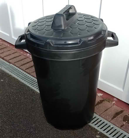 Photo of free Black Plastic Lidded Dustbin - as new (CT6) #1