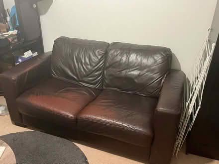 Photo of free 2 seater black leather sofa (Croydon) #1