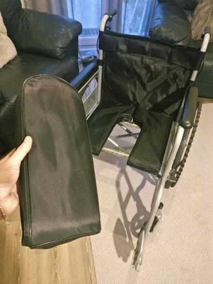 Photo of free Manual Wheelchair • Folding, steel, w/ bedpan option (Fletton) #4