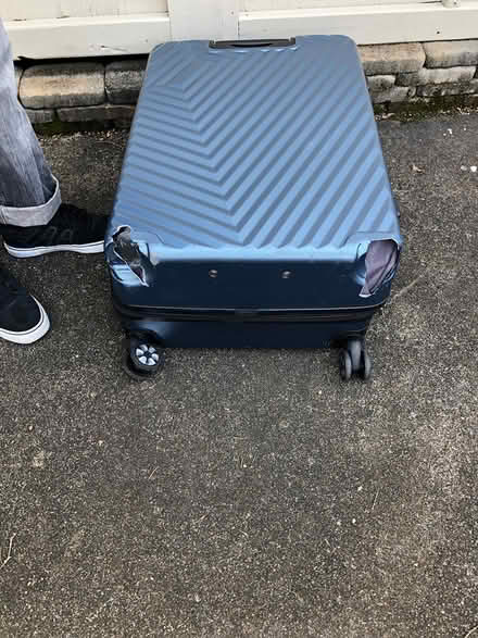 Photo of free Large suitcase (Four Seasons) #2
