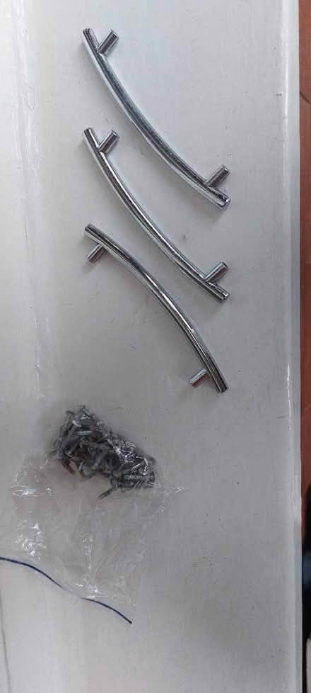 Photo of free 29 chrome cupboard drawer handles. 128cm bolt to bolt. (Southport PR9) #1