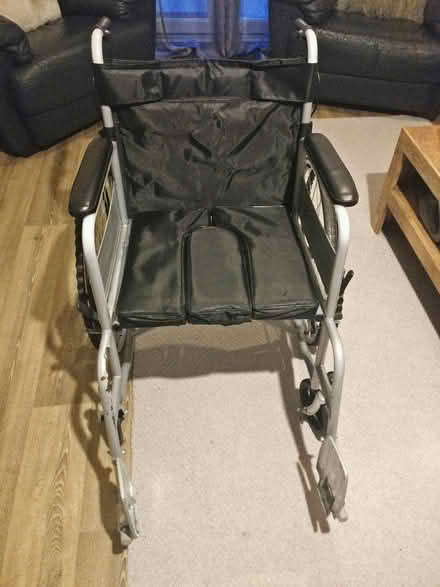 Photo of free Manual Wheelchair • Folding, steel, w/ bedpan option (Fletton) #1