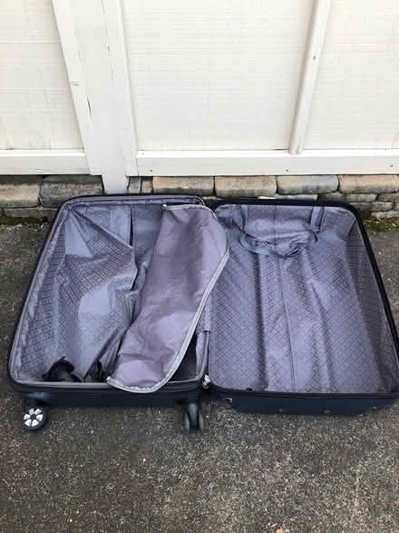 Photo of free Large suitcase (Four Seasons) #3