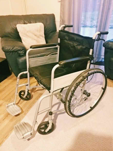 Photo of free Manual Wheelchair • Folding, steel, w/ bedpan option (Fletton) #3