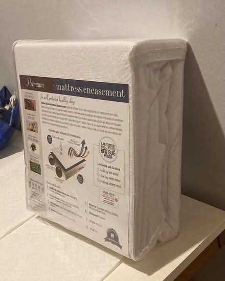Photo of free Mattress + box spring cover - Queen (East Village) #3