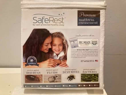 Photo of free Mattress + box spring cover - Queen (East Village) #1