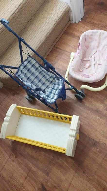 Photo of free Dolly pram carrier musical cot (TW7) #1