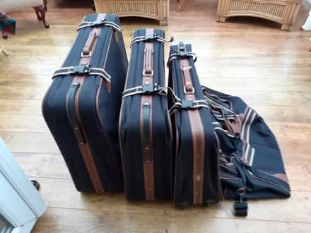 Photo of free Set of three matching suitcases and a holdall (Dean Row SK9) #1
