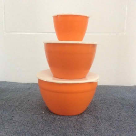 Photo of free Three Orange Plastic Bowls with Lids (AB15) #1