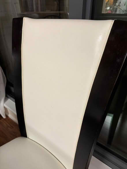 Photo of free 4 wood & white faux leather chairs (DuPont South) #2