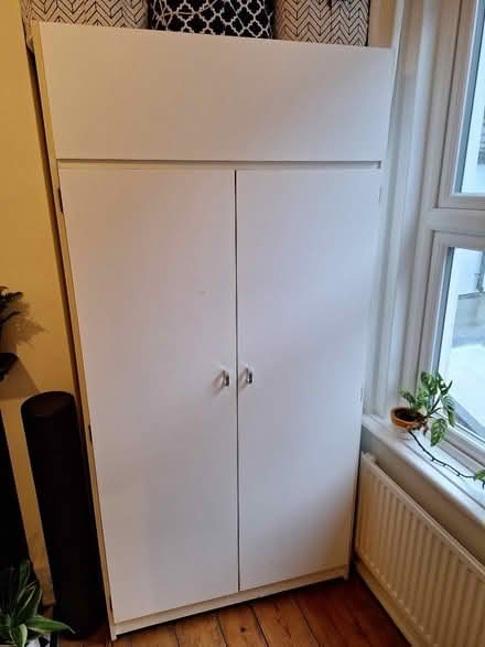 Photo of free White wardrobe with top storage (Preston Park area BN1) #1