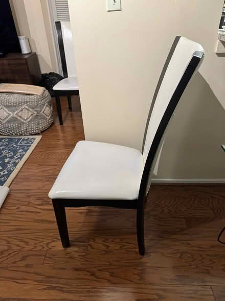Photo of free 4 wood & white faux leather chairs (DuPont South) #1