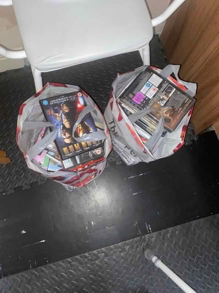 Photo of free 2 bags of dvds (Rowditch DE22) #1