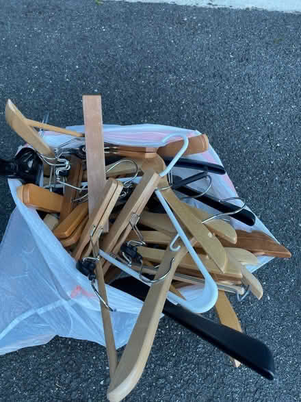 Photo of free Bag of wooden hangers (North Reston) #1