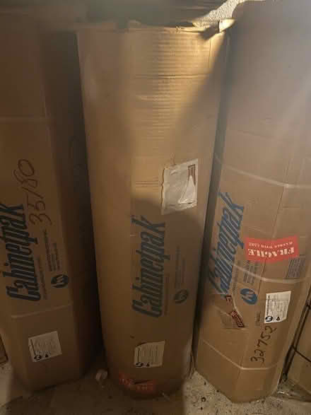 Photo of free 9 large rolls of laminate #2