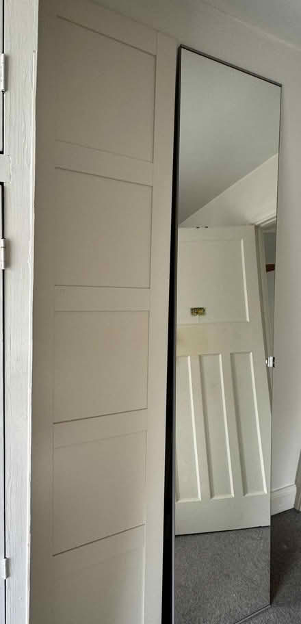 Photo of free Ikea wardrobe doors - mirror and plain white door for a pax (Weston) #1