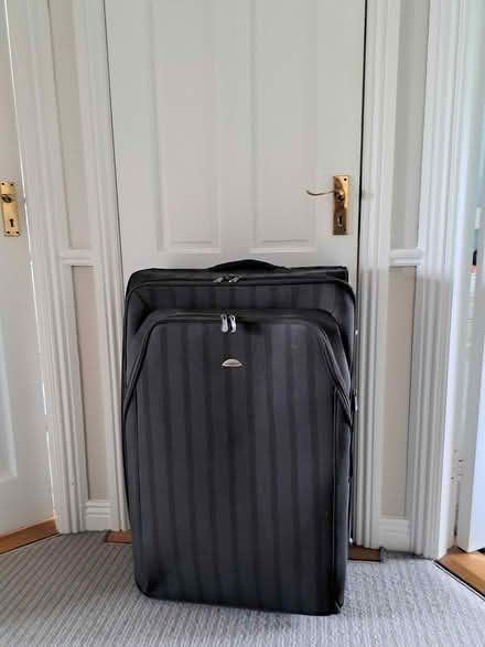 Photo of free Large suitcase (Firhouse) #1