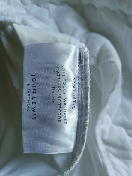 Photo of free John Lewis mattress protector (double) (Streatham Hill SW2) #1