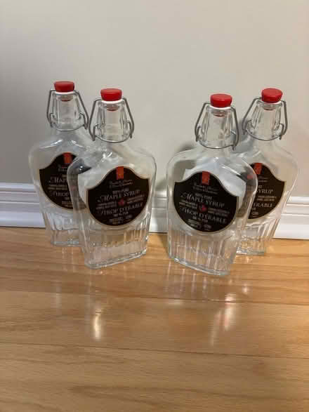 Photo of free Four glass maple syrup bottles (North York Civic Centre) #1