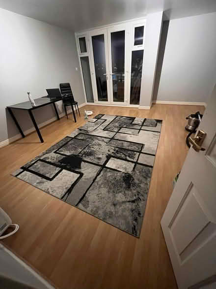 Photo of free Large grey rug (E16) #1